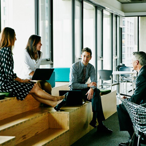 Employees discussing benefits